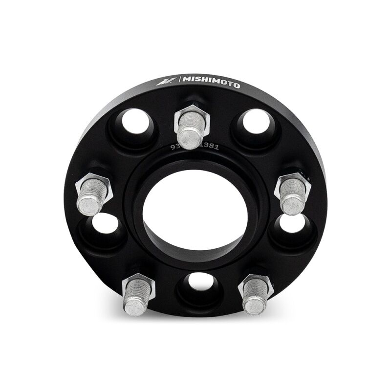 Mishimoto black wheel spacer showing M12x1.5 stud thread pitch and 60.1mm center bore