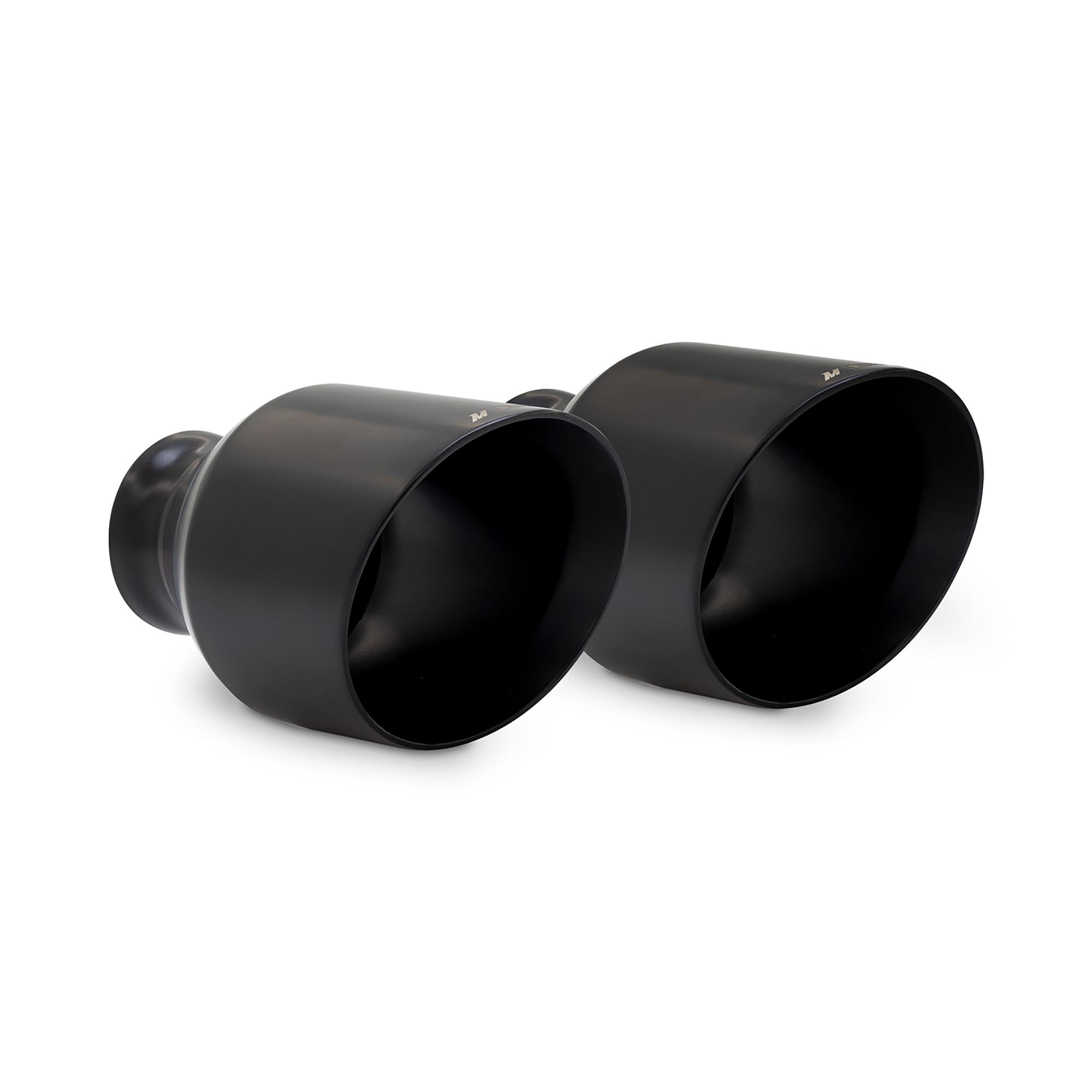 Mishimoto 5-inch black exhaust tip installed on a Dodge Charger rear bumper