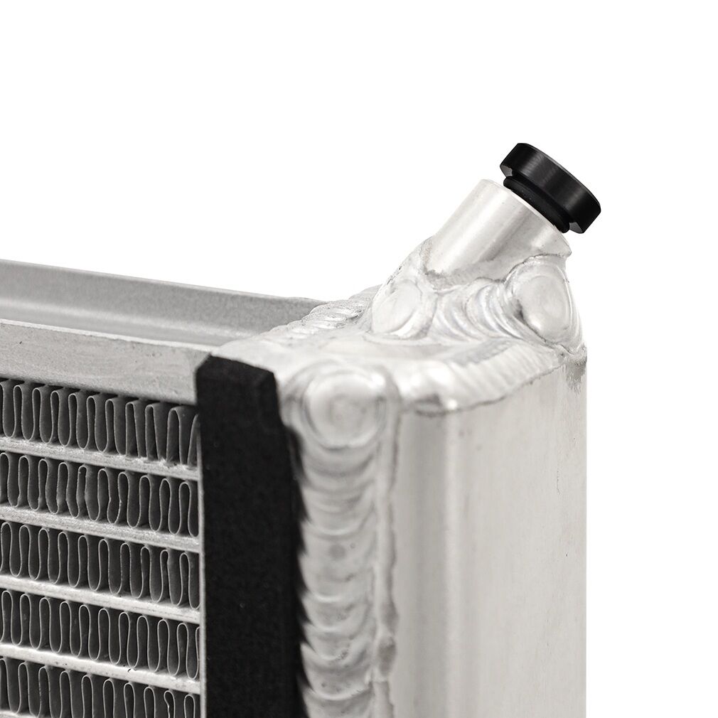 Mishimoto 2023+ Nissan Z heat exchanger shown with compatible stock rock guard