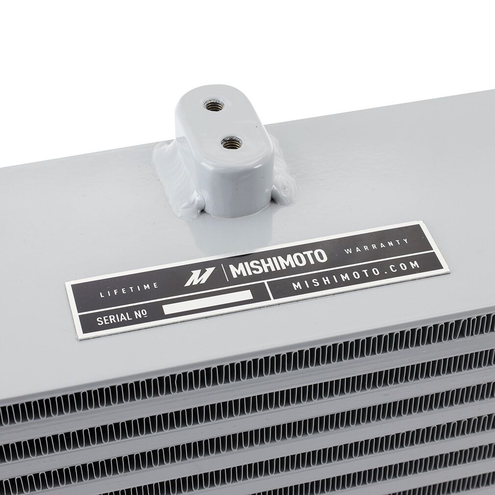 Washer fill neck relocation kit included with Mishimoto Subaru WRX intercooler kit