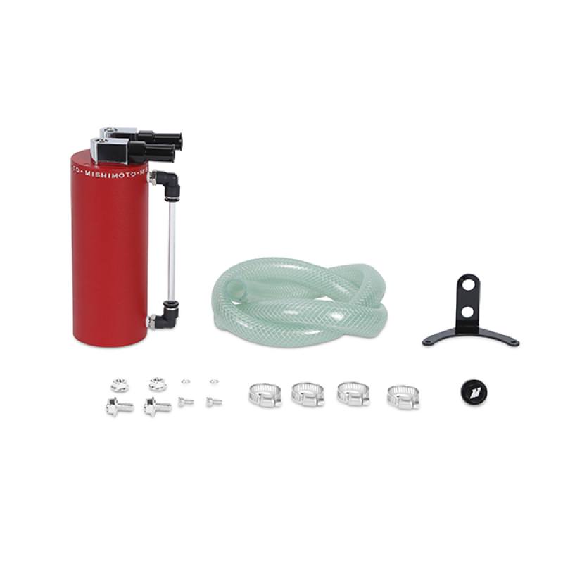 Mishimoto catch can kit contents including black bracket, clamps, fittings, and reinforced hose