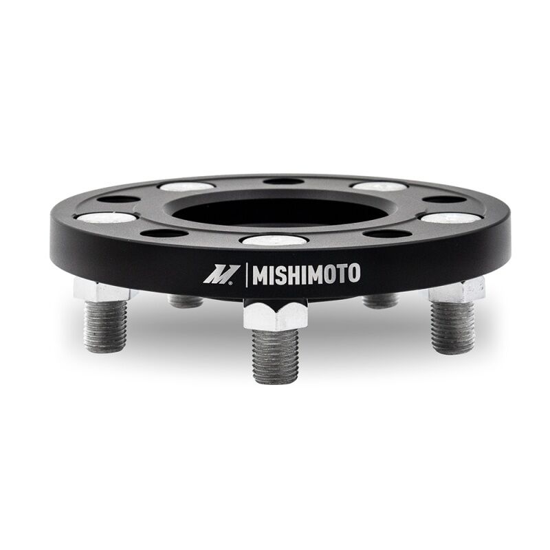 Front view of Mishimoto 15mm black wheel spacer for 5x114.3 bolt pattern wheels