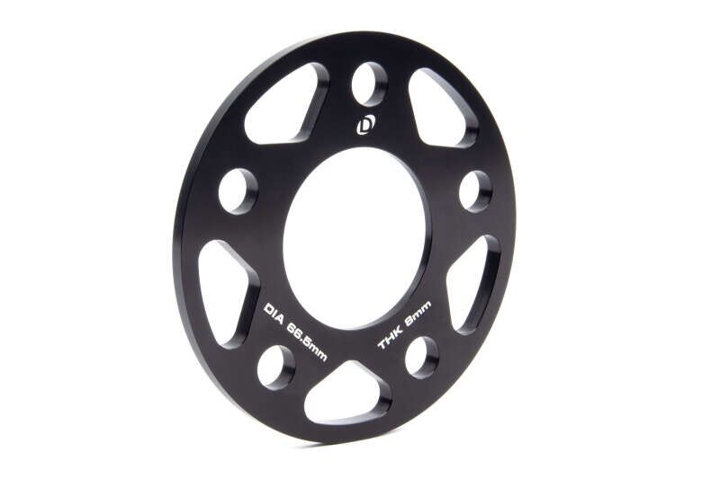 Close-up of Dinan D210-2026 8mm thick wheel spacers